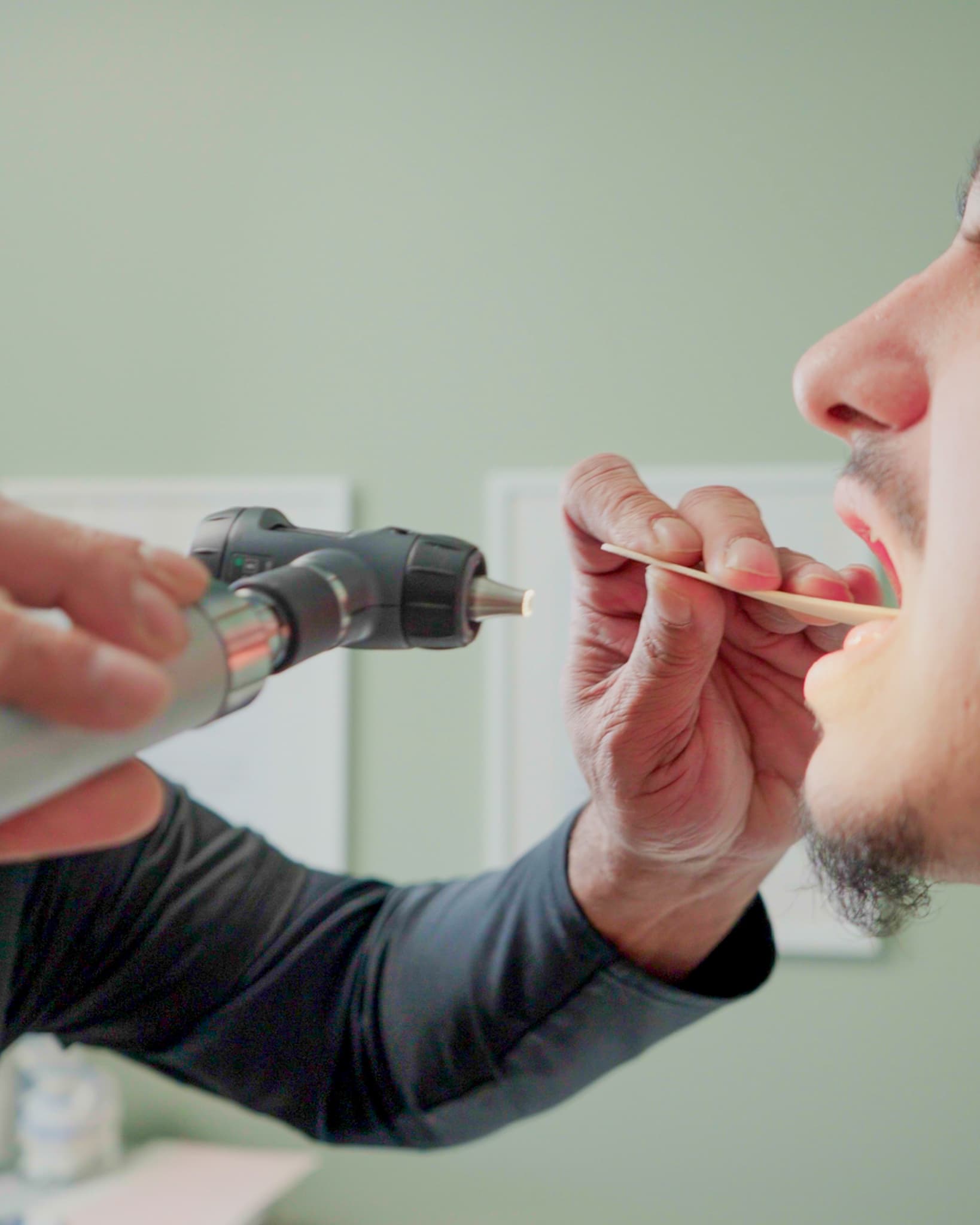 Dr. Aluri performing an exam